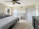 Bright bedroom featuring a ceiling fan and a neutral color scheme at 3736 W South Wood Lake Dr, Columbus, IN 47201