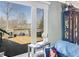 Outdoor view of a deck with lake view, outdoor furniture, and dining table at 3736 W South Wood Lake Dr, Columbus, IN 47201