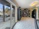 Game room offers outdoor access and built in shelving at 3736 W South Wood Lake Dr, Columbus, IN 47201