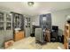 A spacious home office featuring built-in storage, dual monitors, and a work desk at 3736 W South Wood Lake Dr, Columbus, IN 47201