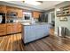 Well-equipped kitchen with stainless steel appliances and a stylish center island at 3736 W South Wood Lake Dr, Columbus, IN 47201