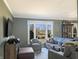 Comfortable living room with large window and furniture at 3736 W South Wood Lake Dr, Columbus, IN 47201