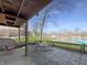 A covered patio with outdoor furniture overlooking waterfront at 3736 W South Wood Lake Dr, Columbus, IN 47201