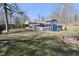 Large backyard featuring a pool and ample space for outdoor activities at 425 Conduitt Dr, Mooresville, IN 46158