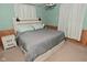 Bedroom features a whitewashed wood headboard and matching nightstand at 425 Conduitt Dr, Mooresville, IN 46158