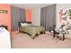 Bedroom featuring carpet, drum set, and window with gray curtains at 425 Conduitt Dr, Mooresville, IN 46158