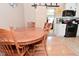 Cozy dining space adjacent to the kitchen featuring a wooden dining table and seating at 425 Conduitt Dr, Mooresville, IN 46158