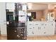 Bright eat-in kitchen featuring white cabinets and stainless steel appliances at 425 Conduitt Dr, Mooresville, IN 46158