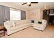 Comfortable living room with neutral decor and an L-shaped sofa, perfect for Gathering gatherings at 425 Conduitt Dr, Mooresville, IN 46158