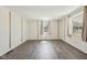Bright, airy bedroom with neutral walls, hardwood floors, and ample natural light from two windows at 4709 S County Road 500 E, Plainfield, IN 46168