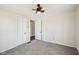 Neutral bedroom featuring carpet and doors at 4709 S County Road 500 E, Plainfield, IN 46168