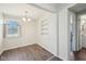 Dining room showcasing a chandelier, window, and built-in shelving at 4709 S County Road 500 E, Plainfield, IN 46168