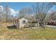 Charming home with a covered porch and mature trees at 4709 S County Road 500 E, Plainfield, IN 46168