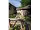 Home exterior with a side-entry garage, landscaping, and decorative potted plants, offering appealing curb appeal at 4709 S County Road 500 E, Plainfield, IN 46168