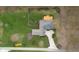 Aerial view showcasing the home with a well-maintained yard, beautiful landscaping, and a spacious deck for outdoor living at 4965 N 500 W, Columbus, IN 47201