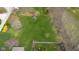 Expansive backyard showing a lush green landscape with mature trees and plantings, offering privacy and natural beauty at 4965 N 500 W, Columbus, IN 47201