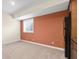 Finished basement bar area with wood cabinets, sink, window and space for a mini fridge at 4965 N 500 W, Columbus, IN 47201