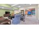 A carpeted basement with an entertainment area and exercise area at 4965 N 500 W, Columbus, IN 47201