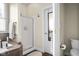 Bathroom with soaking tub, glass shower, tiled floors, and granite vanity at 4965 N 500 W, Columbus, IN 47201