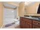 Bathroom features a shower-tub, granite countertops, and vanity at 4965 N 500 W, Columbus, IN 47201