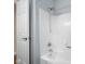 Bathroom features a white shower, bath tub, and shower head with a silver faucet at 4965 N 500 W, Columbus, IN 47201