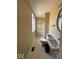 Bathroom featuring a walk-in shower, toilet, sink, vanity and a bright window for natural light at 5155 Overland Ct, Indianapolis, IN 46268