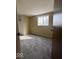 Bedroom featuring a window, carpet and a closet at 5155 Overland Ct, Indianapolis, IN 46268