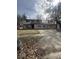 Two story home with attached two car garage and large, mature trees at 5155 Overland Ct, Indianapolis, IN 46268