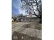 Two story home with attached two car garage and mature trees at 5155 Overland Ct, Indianapolis, IN 46268