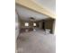 Spacious living room with ceiling fans and view of back yard at 5155 Overland Ct, Indianapolis, IN 46268