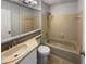 Retro bathroom featuring a bathtub, standard toilet, medicine cabinet and matching fixtures at 6232 Behner Xing, Indianapolis, IN 46250