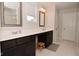 Bright bathroom featuring double vanity, modern fixtures, and a tiled floor at 655 Bracknell Dr, Avon, IN 46123
