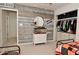 Unique bedroom design with wood paneling, industrial lighting, and trendy décor at 655 Bracknell Dr, Avon, IN 46123