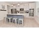 Well-equipped kitchen with stainless steel appliances, a spacious island, and ample cabinet space at 655 Bracknell Dr, Avon, IN 46123