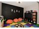 Inviting playroom featuring colorful flooring, beanbag chairs, and ample space for recreation and fun at 655 Bracknell Dr, Avon, IN 46123