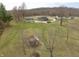 Wide aerial shot of the property and its buildings at 6900 W Georgetown Rd, Columbus, IN 47201