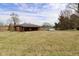 Charming brick home with detached garage and spacious yard at 6900 W Georgetown Rd, Columbus, IN 47201