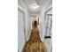 Hallway with wood floors at 6900 W Georgetown Rd, Columbus, IN 47201
