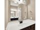 Bathroom view showcasing large mirror, vanity and a neutral wall color at 7326 Wooden Grange Dr, Indianapolis, IN 46259