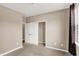 Bedroom featuring carpet and a closet with folding doors at 7326 Wooden Grange Dr, Indianapolis, IN 46259