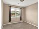 Bedroom featuring carpet and window with curtains at 7326 Wooden Grange Dr, Indianapolis, IN 46259