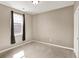 Bedroom featuring carpet, window with curtains and a closet at 7326 Wooden Grange Dr, Indianapolis, IN 46259