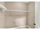 Walk-in closet with wire shelving and neutral wall color at 7326 Wooden Grange Dr, Indianapolis, IN 46259