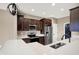 Modern kitchen featuring stainless steel appliances and a double sink at 7326 Wooden Grange Dr, Indianapolis, IN 46259