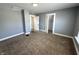 Bedroom features carpeting, neutral paint, and open closet at 745 W 25Th St, Indianapolis, IN 46208