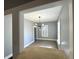 Bright dining area features hardwood floors, natural light and a modern lighting fixture at 745 W 25Th St, Indianapolis, IN 46208