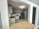 The kitchen featuring white cabinets, modern appliances, and tiled flooring at 745 W 25Th St, Indianapolis, IN 46208