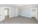 A bedroom with plush carpet and a neutral color scheme offers a serene and customizable space for relaxation and rest at 821 S Lebanon St, Lebanon, IN 46052