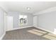A bedroom is filled with natural light and neutral tones offering a blank canvas for creating your ideal retreat at 821 S Lebanon St, Lebanon, IN 46052
