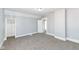 A bedroom featuring soft neutral tones and cozy carpeting provides a comfortable and versatile space for personalizing at 821 S Lebanon St, Lebanon, IN 46052